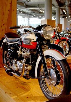 a motorcycle is on display in a museum