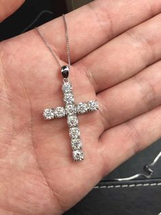 Gorgeous and delicate Moissanite Cross necklace ， A Nice gift for girlfriend/wife or Mother , also good for boyfriend / father or husband Basic information Stone： Top grade Moissanite Color Grade：DF Color （D-F represents the most colorless Moissanite，It is a top Grade） Clarity Grade ： VVS1 Stone Shape: Circle 3mm / 4.5mm Stone weight ： 0.1ct*12 （Total weight 1.2ct） / 0.4ct*11 （Total weight 4.4ct） Metal Materials: Sterling Silver and 18k white gold plated Cut Grade ： Excellent Gia Certified Diamond White Jewelry Gift, Gia Certified Moissanite Jewelry As A Gift, Cubic Zirconia Cross Diamond Necklace For Anniversary, Diamond White Cross Jewelry With Prong Setting, Wedding Diamond Necklace With Vs Clarity, Brilliant Cut Cross Jewelry For Wedding, Brilliant Cut Cross Pendant Jewelry For Anniversary, Gia Certified White Jewelry As A Gift, Gia Certified White Jewelry Gift