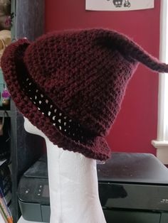 A crocheted slouchy witch hat for any occasion that suits ya! -The hat is handmade using acrylic yarn in a dark red. -The hat is approximately 10 in diameter x 0.5 in tall. The brim width of the beret is approximately 4 in! --The beret should fit an average to larger sized head! (22-24 in circumference) WASHING INSTRUCTIONS: -Machine wash separately in lukewarm water on GENTLE/KNIT cycle with mild soap. Do NOT use fabric softeners as they make the wool limp; rinse well in cold water and spin dry Slouchy Witch Hat, Forest Witch, Slouch Hat, Fabric Softener, Witch Hat, Mild Soap, Washing Instructions, Acrylic Yarn, Dark Red