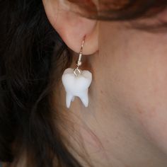 Tooth size is 4x3x3cm  Embrace dental charm with our handcrafted tooth earrings! Perfect for dentists, dental hygienists, or anyone who appreciates quirky accessories. These unique studs make a thoughtful gift and add a touch of dental chic to your style. Show off your love for teeth with these one-of-a-kind earrings! Novelty White Sterling Silver Jewelry, White Sterling Silver Novelty Jewelry, Novelty White Pierced Jewelry, Novelty White Hypoallergenic Jewelry, Novelty Hypoallergenic White Jewelry, Hypoallergenic Novelty White Jewelry, Hypoallergenic White Novelty Jewelry, Novelty Hypoallergenic Jewelry For Everyday, Everyday Novelty Hypoallergenic Jewelry