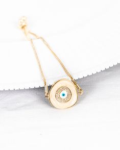 Jewelsbysunaina x Maryamishtiaq Collection Sparkling baby blue enamel brings out all the pretty details of this lucky evil eye charm bolo bracelet, crafted in a rich, bright shine. The spacer bead on the bottom adjusts to your wrist size, making it perfect for laying next to your watch. Metal Type: BrassMetal Plating: Yellow Gold PlatingColor: Turquoise/GoldSize: Adjustable Bolo Bracelet, Good Cause, Evil Eye Charm, The Pretty, Free Items, Spacer Beads, Evil Eye, Types Of Metal, Baby Blue