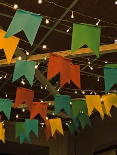 colorful paper pennants hanging from the ceiling