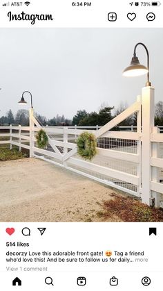 the instagram page on instagram com shows an image of a white fence with wreaths hanging from it