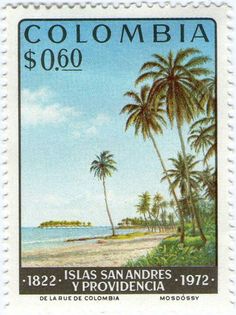 a postage stamp with palm trees on the beach and ocean in the background, colombia