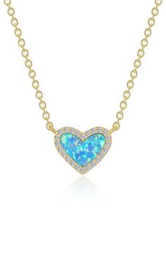 Bring a little sparkle and lustrous romance to any ensemble with this simulated opal heart pendant necklace traced in pavé simulated diamonds. 20" length; 3/8" pendant drop Sterling silver/18k-gold plate/simulated opal/simulated diamond Imported >Diamond Guide Elegant Blue Heart Necklace, Elegant Blue Necklaces For Valentine's Day, Fine Jewelry Blue Heart Necklace, Elegant Blue Jewelry With Heart Charm, Blue Heart-shaped Fine Jewelry Necklace, Elegant Blue Heart Necklace With Birthstone, Elegant Blue Heart Necklace For Valentine's Day, Elegant Blue Birthstone Heart Necklace, Blue Heart Pendant Necklace With Diamond Accents