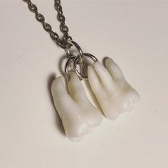 "YOU MUST SEND ME A TOOTH FOR THIS LISTING (OR TWO TEETH). If you have 3 or 4 teeth you must buy this other listing instead: https://www.etsy.com/listing/568883946/your-supplied-teeth-real-human-molar This listing is for ONE necklace like pictured here WITH YOUR SUPPLIED TOOTH/TEETH. PLEASE READ THE ENTIRE LISTING. Will include one 24\" necklace (last photo show chain examples - top is gunmetal, middle in antique silver, bottom is antique brass.) How many roots your tooth has will depend on how Wisdom Teeth Necklace, Tooth Jewellery, Bat Ears, Molar Tooth, Teeth Jewelry, Tooth Necklace, Must Buy, Funky Jewelry, 1 Or 2