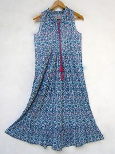 "ITEM DESCRIPTION women maxi style dress-raglan sleeve less maxi dress - boho hippie dress v neck with tassel - indian traditional dress Features : Long sleeve, V neck, Long dress Material : Cotton Voile Fabric: 100% cotton soft light weight ethnic print fabrics Sleeve Length = 22 inch For more sizes & their measurement, please refer our below chart to understand the sizes variations available with us For your size requirement, please mention your size in seller note at the time of buying. S Summer Cotton Maxi Dress With Tassels, Casual Tassel Maxi Dress For Spring, Casual Maxi Dresses With Tassels, Sleeveless Tasseled Maxi Dress For Summer, Sleeveless Tassel Maxi Dress For Vacation, Multicolor Maxi Dress With Tassels, Blue Tassel Maxi Dress For Summer, Blue Maxi Dress With Tassels For Summer, Summer Blue Maxi Dress With Tassels