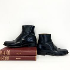 "Vintage 1960s mens leather chelsea boots featuring; a slightly squared off toe zip inside the ankle  1 1/4 inch heel with rubber cap smooth leather sole short shaft of a soft, supple leather with a bit of a sheen in jet black labeled \"The Florsheim Shop\" these are stamped a men's size 7 D on the inside , measurements taken inside the boot are; 10 1/4 inches from heel to toe 3 1/2 inches across the ball of the foot 2 3/4 inches across the heel of the foot in good, preworn, vintage condition wi Mens Heeled Boots, 1970s Shoes, Men Leather Boots, Men In Heels, Chelsea Boots Men, Vintage Boots, Black Leather Shoes, Leather Chelsea Boots, Mens Leather