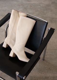 White vegan knee-high boots with heels Chalk is a vegan boot crafted from faux leather with a polished white finish. Coming in a knee-high, it features a chunky block heel and slim, squared toes. Plus, full-length zippers on the side ensure they slip on and off with ease. Vegan Leather Boots, Modern Square, Like A Boss, Warm White, Knee High Boots, Leather Boots, Chalk, Vegan Leather, Sweater Dress