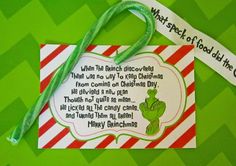 a green and red striped paper tag with the grinch quote on it