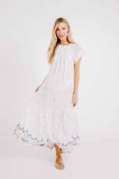 MIRTH women's long tiered short sleeve vienna maxi dress in white carnival handloomed cotton jamdani Traditional Summer Dresses With Woven Motifs, Traditional Dresses With Woven Motifs For Summer, Elegant Beach Dress With Chikankari Embroidery, White Chikankari Embroidered Summer Dress, White Chikankari Embroidery Summer Dress, White Chikankari Embroidery Dress For Summer, Summer Cotton Embroidered Dress With Woven Motifs, Summer Embroidered Cotton Dress With Woven Motifs, Traditional White Midi Dress For Summer