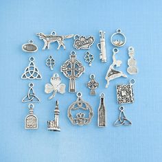 a collection of charms on a blue background