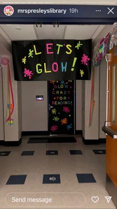 an empty hallway with a sign that says let's glow