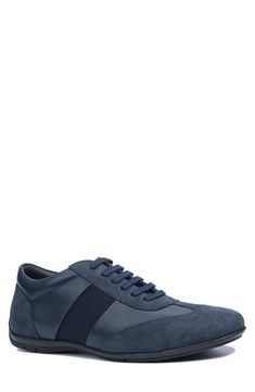 Tonal colorblocking adds subtle dimension to a lace-up sneaker with a silhouette that adds a touch of sporty styling to your ensemble. Pull-on style with elastic laces Removable insole Leather upper and lining/rubber sole Imported Sneaker Men, Elastic Laces, Blue Suede, Mens Shoes Sneakers, Nordstrom Rack, Slip On Sneaker, Color Blocking, Rubber Sole, Men's Shoes