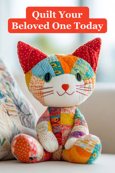 a colorful cat stuffed animal sitting on top of a couch with text overlay that reads, quilt your beloved one today