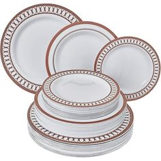 white and gold dinner plates stacked on top of each other