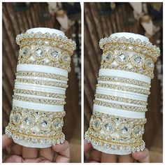 two pictures of white and gold bracelets with crystal stones on each bangle, one in the shape of a stack