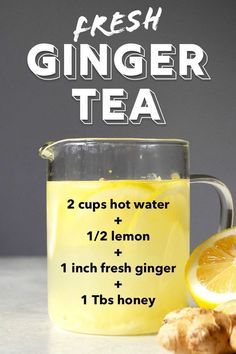 a glass mug filled with lemon and ginger tea