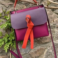 Feminine multicolored medium-sized bag made of genuine leather with original design. Unlined interior. Closed with a magnet. Has a decorative bow. Inside there is a spacious zip pocket. Wide shoulder strap (125cm (49,2 inches)) is adjustable. Bag size 24 * 19 * 5cm (7,9 * 7,5 * 2 inches) The bag can be sewn from any leather in our palette, as well as from various leather combinations. Modern Pink Satchel Flap Bag, Modern Pink Flap Shoulder Bag, Pink Top Handle Satchel With Leather Handles, Modern Pink Shoulder Box Bag, Modern Pink Flap Bag With Detachable Handle, Gift Box Bag With Detachable Strap And Double Handle, Modern Pink Square Box Bag, Double Handle Box Bag With Detachable Strap As Gift, Modern Pink Bag For Everyday Use