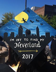 a graduation cap with the words i'm off to find my neverland on it