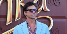 Image via Shutterstock
John Stamos is a known comedian. So hopefully he can get a good laugh out of a couple of zingers thrown his way by his wife Caitlin McHugh. McHugh, who married Stamos in 2018, spoke with Fox News about their relationship. But she did so in a very cheeky manner. "I guess it has been […]
The post John Stamos's Wife Makes Lewd Joke About His Past Romances appeared first on Wide Open Country.