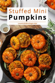 stuffed mini pumpkins in a cast iron skillet with herbs and seasoning on the side