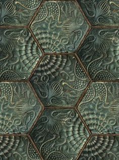 an image of a tile pattern that looks like hexagonals with intricate designs