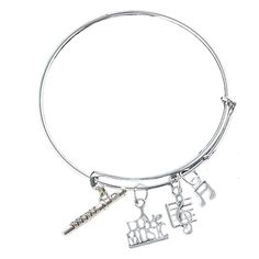 ⭐MUSIC NOTE JEWELRY- Music Flute Charm Bangle Bracelet with Birthstone ⭐MUSIC BRACELET-Silver Plated Music charms on stainless steel bangle bracelet ⭐ADJUSTABLE- Adjustable Bangle Bracelet, Made to Accommodate Most Girls Wrist Sizes ⭐GIFT IDEAS -Perfect gifts for her (birthday or just because) ⭐Free Beautiful Gift Jewelry Pouch - Comes in a beautiful jewelry bag for easy gift-giving. Whether it is a gift for you or someone else, the surprise you get when you open the gift will make you smile. Music Note Jewelry, Music Bracelet, Gifts For Her Birthday, Adjustable Bangle Bracelet, Stainless Steel Bangles, Bangle Bracelets With Charms, Adjustable Bangle, Music Note, Charm Bangle