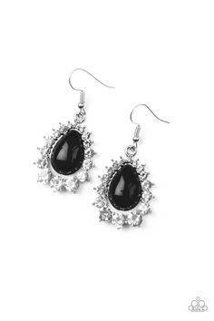 pair of earrings with black stone and crystal stones on the bottom, hanging from silver hooks