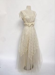 Vintage Lace Wedding Dress For Debutante Ball, 1950s Style Vintage Dress With Fitted Bodice For Wedding, Vintage Lace Wedding Dress For Formal Occasion, 1950s Dress Formal, Tea Length Lace Trim Wedding Dress, 1800s Wedding Dress, 1950s Style Cream Party Dress, Cream Fitted 1950s Style Dress, Retro Vintage Cream Dress With Lace Trim