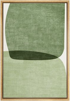 an abstract painting in green and white with a wooden frame on the wall above it