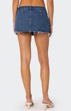 Online only! Introducing the Clementine Low Rise Denim Micro Skort from Edikted, a stylish blend of denim shorts and skirt design. With a low-rise fit and distressed hem, this micro skort offers a trendy and casual look for any occasion. Perfect for those seeking both comfort and style in their summer wardrobe.


	Micro skort
	Distressed hem
	Denim fabric
	100% Cotton
	Model wears size S
	Model height is 5'8
	Item care: Machine wash at maximum of 30C, do not bleach, tumble dry low, iron at a maximum of 110C, do not dry clean. Slim Fit Cargo Pants, Curve Jeans, Dad Jeans, Jeans Kids, Kids Swimwear, Low Rise Jeans, Slim Fit Pants, Low Iron, Skirt Design