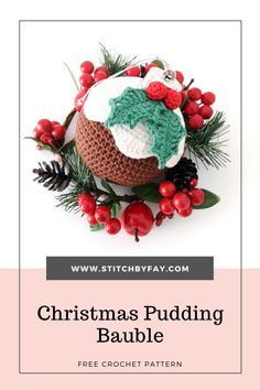 a crocheted christmas pudding with holly and berries on it is featured in the pattern