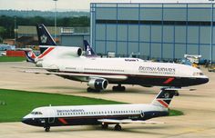 two large passenger jets sitting on top of an airport tarmac next to each other