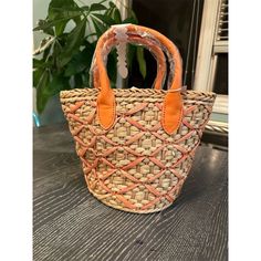 Introducing The L*Space Top Handle Bag, A Chic Accessory Crafted From Natural Straw With Vibrant Orange Accents. This Stylish Bag Features Double Orange Handles Wrapped In Plastic For A Comfortable Grip And An Intricate Woven Design With Eye-Catching Orange Crisscross Detailing. The Open Top Design Makes It Perfect For Casual Outings, Beach Days, Or A Relaxed Brunch With Friends. Measuring 7 Inches In Width And Height, It’s The Ideal Size For Your Essentials. New With Tags (Nwt). Keywords: L*Space, Top Handle Bag, Straw Bag, Orange Accents, Woven Design, Casual Bag, Beach Bag, Brunch Accessory, Open Top, Double Handles, Women's Bag, Summer Bag, Stylish Tote, New With Tags. Brand: L*Space Space Bags, Bag Summer, Orange Accents, Summer Bag, L Space, Woven Design, Chic Accessories, Top Design, Vibrant Orange