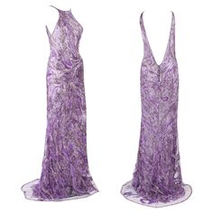 Atelier Versace Wisteria Purple Fully Beaded Silk Dress Gown Designer size 42 ( run smaller - measurements provided ) 100% Silk Wisteria Purple Dress with Tulle Fully Embellished Overlay. Measurements: Bust - 32 inches, Waist - 26", Hips - 34". Made in Italy New without tag. The Haute Couture collection - Atelier Versace - defines craftsmanship and elegance. The master tailors create each piece by hand in the in-house Atelier. Purple Vintage Dress, Vintage Purple Dress, Wisteria Purple, Gown Designer, Silk Dressing Gown, Dress With Tulle, Versace Dress, Atelier Versace, Purple Silk