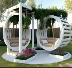 an outdoor living area with two circular chairs