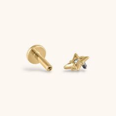 Our North Star stud earring - a tiny little starburst that guides you where you need to go. Wear it as a reminder to follow your true path - and share it with the person in your life who is brave enough to listen to their heart. Our internally threaded flat back earring studs are made of solid implant grade titanium and are hypoallergenic and always nickel free. One earring, infinite possibilities. Make it yours. We offer the flat back stud earrings as singles; if you'd like a pair, please order Titanium Flat Back Earrings, Flat Piercing, Celestial Crystal, Cartilage Piercings, Ear Party, Flat Back Earrings, Titanium Earrings, Moon Studs, Infinite Possibilities