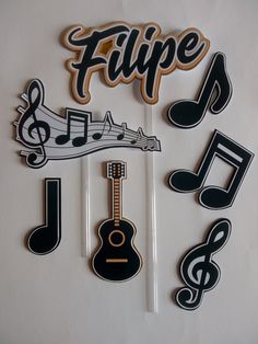 some cutouts that say,'filipe'and have musical notes on them