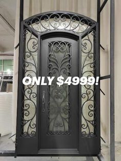 an ornate iron door with glass panels on the front and side doors are shown in black