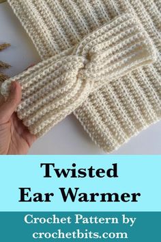 the finished knitted ear warmer with text overlay that reads, twisted ear warmer crochet pattern by crochets com