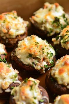 baked stuffed mushrooms with cheese and herbs on the top are ready to be eaten or served