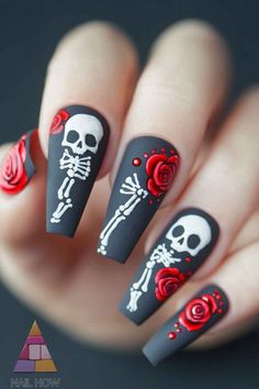 Unleash your inner goth with these spooky skeleton and roses Halloween nails. The matte black base with red roses and white skeletons creates a perfect balance of edgy and elegant. Perfect for adding a dramatic flair to your Halloween ensemble. Discover how to nail this look at nailhow.com! ��💀🌹 Pin this for your Halloween inspiration! Gel Nail Halloween Designs, Skeleton Nails Designs, Red Halloween Nails Acrylic, Halloween Red Black Nails, Red Nails Halloween, Red And Black Nails Design Halloween, Halloween Nails 3d Art, Black And Red Halloween Nails, Classy Halloween Nails