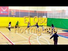 people are playing frisbee in an indoor basketball court with the words elos hormauro on it