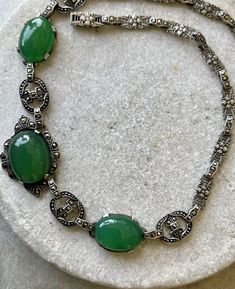 Circa 1920s Beautiful Authentic Art Deco Sterling Silver Green Chrysoprase Marcasite Vintage Antique Necklace Art Deco Jewelry Measeures aprox 17 inches around Antique Green Oval Jewelry, Vintage Jade Necklace For Formal Occasions, Vintage Green Gemstone Jewelry, Vintage Oval Jade Necklace, Vintage Jade Necklace With Natural Stones, Victorian Oval Green Necklace, Ornate Green Oval Necklaces, Antique Green Oval Necklace, Antique Green Jade Necklace