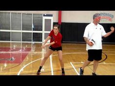 a man and woman are playing basketball on a court with the words developing conscity in serve receive & passing