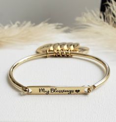 Gold Silver Custom Bangle, My Tribe Bangle, Personalized Bracelet, Mom Bracelet, Grandma Bracelet, Charm Bracelet, High Quality! Available in Gold and Silver. 14k Gold Over Stainless Steel, Durable Bangle Send me a note upon checkout with names/personalization. To care for your jewelry and keep it clean and ready to wear, gently wipe off excess make-up and skin oils after each wearing. Use a nub free, 100% cotton cloth and gently wipe the piece clean using only the soft pads of your fingers. Sto Grandma Bracelet, Custom Bangle, Mom Bracelet, Oak Forest, Bangle Silver, Moms Bracelet, Personalized Bracelet, Bear Necklace, Gold Charm Bracelet