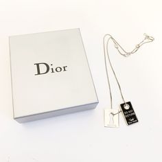 "Brand Christian Dior/クリスチャンディオール Color Silver×Black Actual size Chain length: 40cm/ 15.748 in parts 1: length 2.5cm x width 1.5cm/ length 0.9843 in x width 0.5905 in parts 2: length 2cm x width 1.5cm/ length 0.7874 in x width 0.5905 in ※1 inch 2.54 cm Condittion good condition. Others are not, such as dirt and damage that stands out, it is a good state. with a storage box. Vintage, used clothing, thank you for your purchase of on who understand the characteristics of the foreign products. 多少の使用 Designer Metal Necklaces For Gifts, Designer Silver Jewelry With Clavicle Chain, Formal Silver Necklace With Logo Charm, Elegant Silver Necklace With Logo Charm, Elegant Jewelry With Silver-tone Logo Plaque As Gift, Sterling Silver White Gold Necklace With Logo Charm, Elegant Silver Necklaces With Silver-tone Logo Plaque, Silver Necklace With Silver-tone Logo Plaque For Gift, Elegant Silver Necklace With Silver-tone Logo Plaque