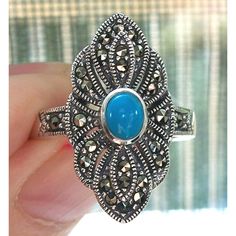 Nwot Sterling Silver Ring, Sizes 7, 8, 9 Only. This Gorgeous Women's Fashion Ring Has An Inlaid Round 3.8 X 3.8 (Mm) Simulated Turquoise In The Center With Marcasite's Stones In The Silver Design Around It And On The Band. It's 23.2 (Mm) Long, Is Stamped 925 And Has A Rhodium Finish For Greater Shine And Durability. Comes From A Smoke Free Home. Silver Turquoise Ring With Accent Stones In Sterling Silver, Sterling Silver Turquoise Ring With Accent Stones, Blue Hallmarked Turquoise Ring, Elegant Silver Turquoise Ring In Sterling Silver, Sterling Silver Crystal Ring, Womens Rings Fashion, Art Ring, Marcasite Ring, Rings Jewelry Fashion