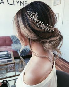 a woman wearing a bridal hair comb